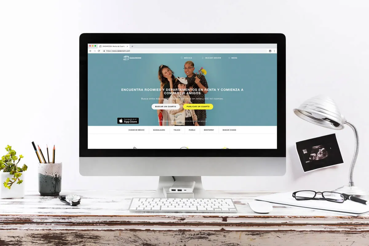The Dadaroom marketplace — find roomies and apartments for rent — shown on a desktop monitor