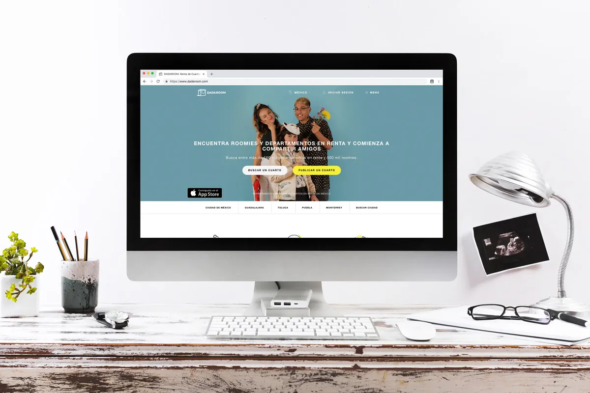 The Dadaroom marketplace — find roomies and apartments for rent — shown on a desktop monitor